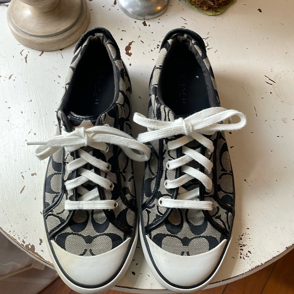 Women’s Coach sneakers. Size 9.5. Black and white low tops.
